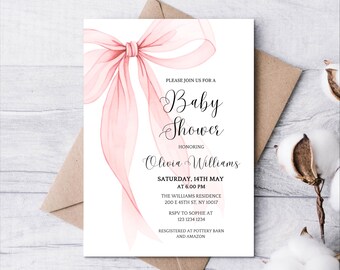 May include: Baby shower invitation with a watercolor pink bow and flowing ribbons. The invitation includes the text "Please join us for a Baby Shower honoring Olivia Williams" and event details. The invitation is on a white background.