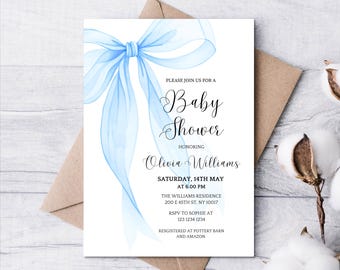 May include: Baby shower invitation with a watercolor blue bow and ribbons on a white background. The invitation includes the text "Baby Shower" and details for Olivia Williams' baby shower.