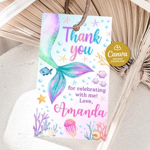 May include: A mermaid-themed thank you tag with a watercolor design. The tag features a mermaid tail, fish, and coral. Text includes "Thank you" and "for celebrating with me! Love, Amanda."