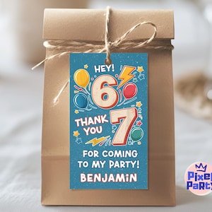 May include: A brown paper gift bag tied with twine, featuring a blue tag with the text "HEY! 6 THANK YOU 7 FOR COMING TO MY PARTY! BENJAMIN". The tag has colorful balloons, lightning bolts, and stars. The Pixel Party logo is in the bottom right corner.