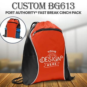 May include: A red and black cinch pack with a white border and a zippered top pocket. The bag has a mesh side pocket and a drawstring closure. The text "YOUR DESIGN HERE" is printed on the front. The bag is designed to hold water bottles.