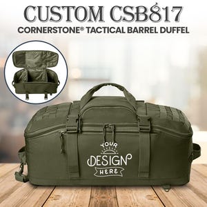May include: Olive green Cornerstone Tactical Barrel Duffel bag with the text "CUSTOM CSB817" and "YOUR DESIGN HERE". The bag has multiple compartments, handles, and straps. A smaller image of the bag's interior is in the upper left corner.