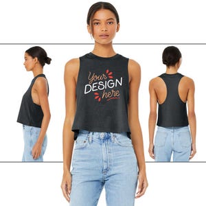 May include: Dark gray crop top with the text "Your DESIGN here" in white and red. The sleeveless top is shown from the front, side, and back views. The model is wearing light blue jeans.