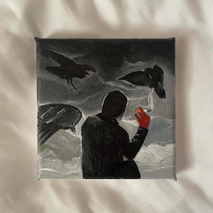 May include: A painting of a person in a hooded jacket and black pants, holding a cigarette. The person is sitting in front of a dark background with two black birds flying above. The painting is done in a dark and moody style.