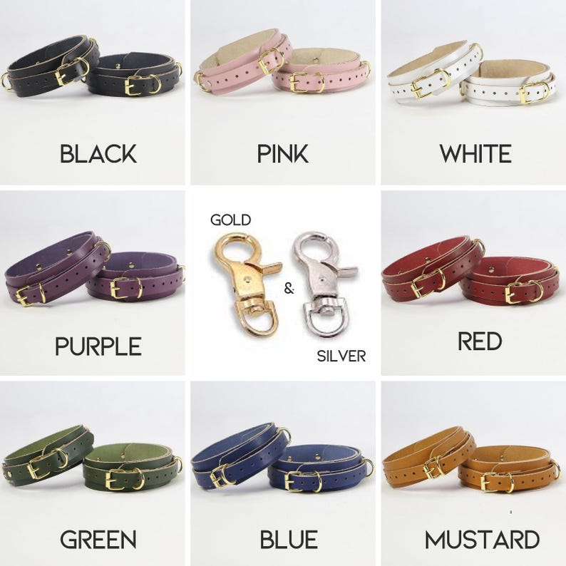 May include: A collection of leather wrist cuffs in various colors, including black, pink, white, purple, red, green, blue, and mustard. Each cuff features a gold-colored buckle and hardware. The image also shows gold and silver-colored clasps.