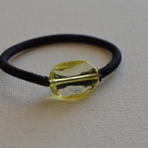 Yellow wavy acrylic oval bead, ponytail holder