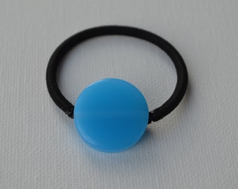 Bright blue round resin bead ponytail holder