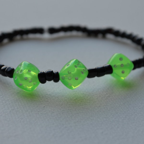 Bunco bracelet, black glass seed beads with 3 lime green dice, stretch bracelet