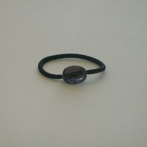 Purple oval Czech glass bead, with Picasso stone finish, ponytail holder image 1