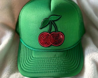 Green Cherry Trucker Hat – Bold, Playful, and Sweet
