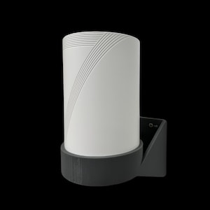 May include: A white cylindrical smart home device with a textured surface and a black base. The device is mounted on a black wall mount.