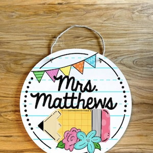 Colorful Circle Teacher Name Sign; paper pencil Round sign