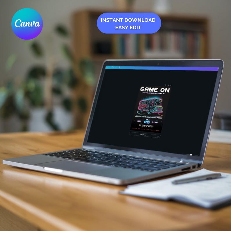 May include: A silver laptop displaying a digital invitation with the text "GAME ON" and a neon-style graphic of a food truck. The screen also shows "INSTANT DOWNLOAD EASY EDIT" and the Canva logo. A pen and notepad are on the wooden surface.