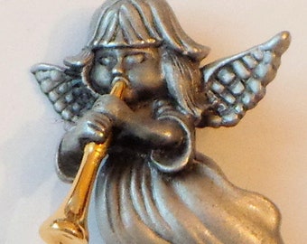 Adorable vintage Christmas angel Pewter angel girl blowing a gold tone trumpet signed Daria designer brooch