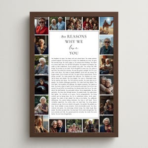 May include: A framed collage featuring multiple photographs and the text "80 REASONS WHY WE love YOU." The photos depict various people, including an older woman, and a camel in the desert. The frame is a dark brown color.