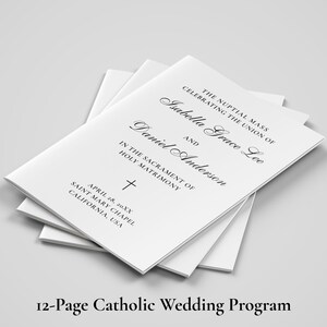 May include: A stack of white wedding programs with black text. The programs are for Isabella Grace Lee and Daniel Anderson, with the date, location, and a cross symbol. The text "12-Page Catholic Wedding Program" is at the bottom.