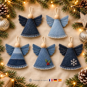 May include: Five decorative angel ornaments crafted from denim fabric with wooden bead heads and hanging loops. The angels feature various shades of blue denim, frayed bottom edges, stitched wing details, and accents including holly and a snowflake.