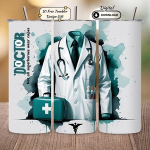 May include: A white tumbler featuring a doctor's coat, stethoscope, and medical kit design. The text "DOCTOR" and "Not all superheroes wear capes" are displayed. Includes a "Digital Download" badge and a "10 Free Tumbler Design Gift" badge.