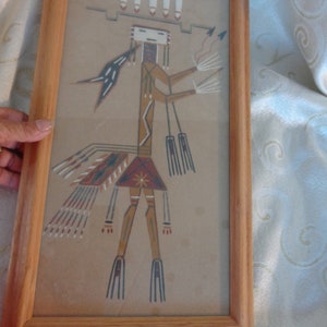 NAVAJO YEI Sand Art by Wilson Price Sr. 9 1/2&quot; X 18&quot; with Frame  Girl holds arrows and feathers are above her
