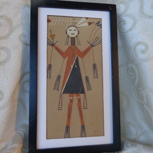 NAVAJO YEI WITH arrows and flower Sand Art  in black matted frame
