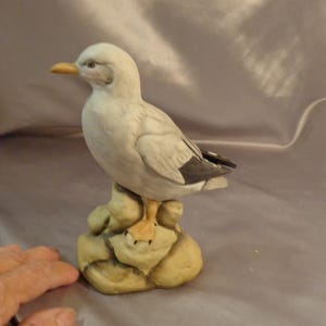 SEAGULL PORCELAIN FIGURINE - 6 1/4&quot;H x 3&quot;W x 6&quot; L   Hand Painted Ocean Seagull Standing on Rocks