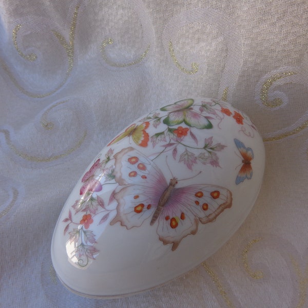 AVON BUTTERFLY 5 1/2" EGG -  Porcelain 2 Pc Egg -  5 1/2" x 3 1/4  x  3 1/2" High Two Piece 1974 Floral and Butterfly Egg