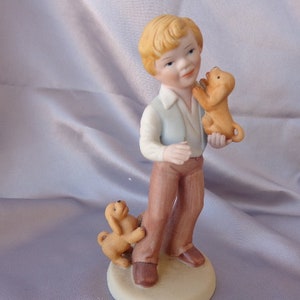 AVON BEST FRIENDS  1981  Boy with Dogs Figurine - 1981 Porcelain Bisque 6 1/2&quot; High Figurine