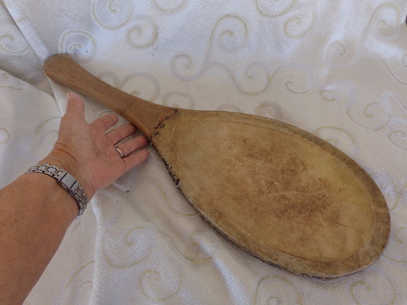 ESKIMO PADDLE DRUM Leather and Sinew on Wood 22l X 7 1/4w X 3/4d Two-sided  Hollow Leather Hand Made Paddle Drum With Wood Frame 