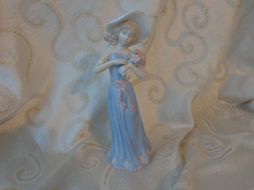 GATHERING FLOWERS HOUSE of Lloyd 1998 8 1/2 Tall Porcelain Figurine