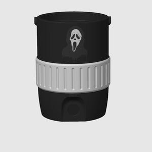 May include: Black tumbler with a white and gray Scream mask graphic. The tumbler has a white band around the middle and a black base. The tumbler has a handle on each side.