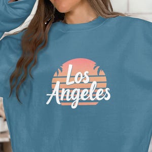 Los Angeles sunset graphic sweatshirt, California themed clothing, retro style city sweatshirt, trendy casual wear, Los Angeles Palm Trees
