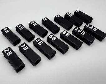 The Original Pencil Caps with Braille, Raised Text, and High Color Contrast