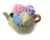teapot cozy with spring  pastle crochet roses