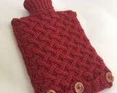 Hot water bottle cover and two litre  hot water bottle in red included