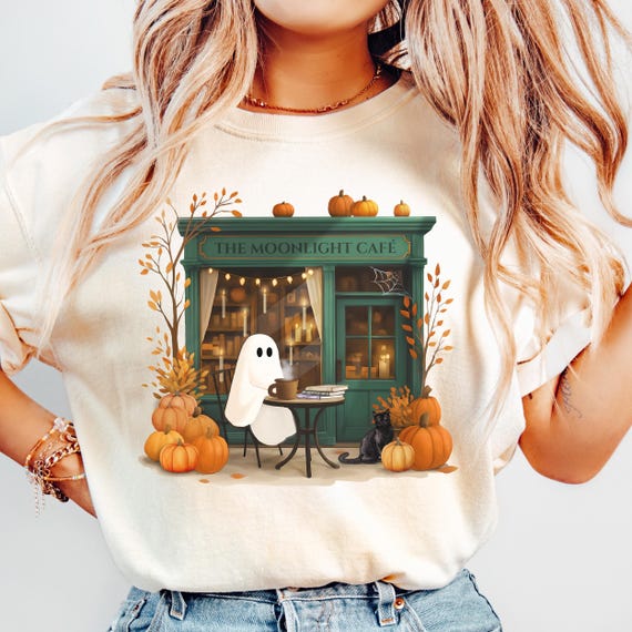 Ghost Cafe Halloween shirt, Cozy Halloween Ghost Tee, Books & Coffee Lover Gift, Ghost drinking coffee shirt, Cozy Fall Coffee lover tshirt