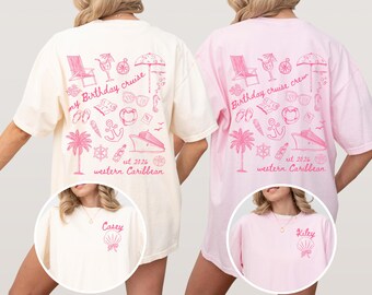 May include: Two oversized t-shirts, one cream and one pink, featuring a pink graphic design. The design includes a palm tree, cruise ship, and text that reads "my Birthday cruise" and "western Caribbean". The cream shirt has "Casey" printed on the front, and the pink shirt has "Riley".