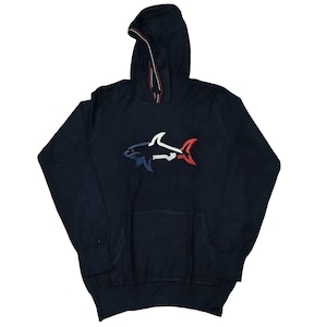 May include: Navy blue hooded sweatshirt with a shark logo. The shark design features white, red, and blue accents. The hood has a white and red stripe detail. The sweatshirt has a front pocket.