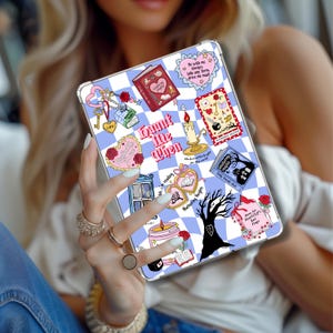 May include: A tablet case featuring a blue and white chequered design, decorated with illustrations of books, hearts, roses, and the words "Haunt Me Then". The case has a romantic and whimsical theme.