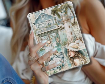 May include: A tablet case with a coastal design, showing a blue house, a lighthouse, and a woman wearing a hat. The artwork includes seashells and palm trees, with a watercolour style. The case is held by a person wearing several rings.