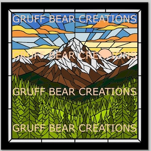 May include: A stained glass panel featuring a mountain landscape with snow-capped peaks, brown mountains, and a forest of green trees. The sky is blue with orange and yellow clouds. The text "GRUFF BEAR CREATIONS" is repeated across the top, middle, and bottom.