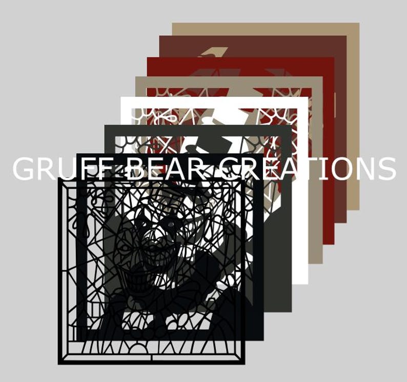 May include: A stack of laser-cut art pieces in various colors, including black, white, and shades of brown and red. The front piece features a detailed, abstract design with the text "GRUFF BEAR CREATIONS".