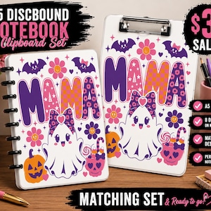 May include: An A5 discbound notebook and a clipboard featuring a white background with a repeating pattern of purple ghosts, orange pumpkins, pink flowers, and bats. The text MAMA is printed in large purple and orange checkered letters on both items.