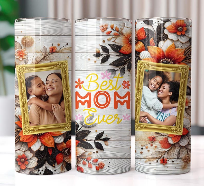 May include: Three stainless steel tumblers with floral designs and a photo of a mother and daughter. The tumblers have the text "Best Mom Ever" printed on them.