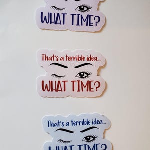May include: Three stickers with the text "That's a terrible idea..." and "WHAT TIME?" in different colors. Each sticker features a pair of eyes, one winking and the other open. The stickers are white with a cloud-like shape.