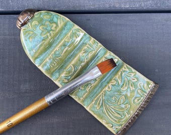 Handmade Ceramic Brush Rest: Paint Tube Design, Floral Accents