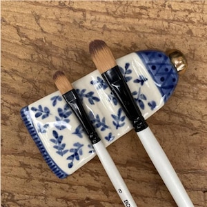 New! Handmade Ceramic Brush Rest: Paint Tube with Blue and White Flower Accents