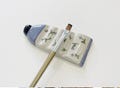 Handmade Ceramic Brush Rest: Paint Tube with Tiny Flower Accents