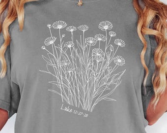 Bible Verse Shirt | Luke 12:27-28 Tee | Christian Wildflower Graphic T-Shirt | Faith-Based Gift | Floral Scripture Tee for Women
