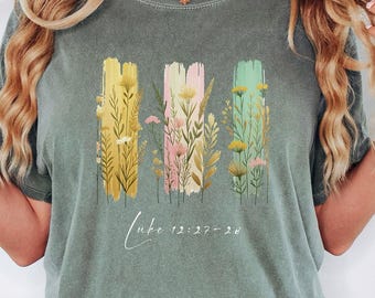 Wildflower Bible Verse T-Shirt | Luke 12:27-28 Christian Tee | Faith Floral Shirt | Painted Pastel Scripture Gift for Her | Inspirational