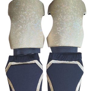 pro wrestling trunks with kneepads and kickpads.